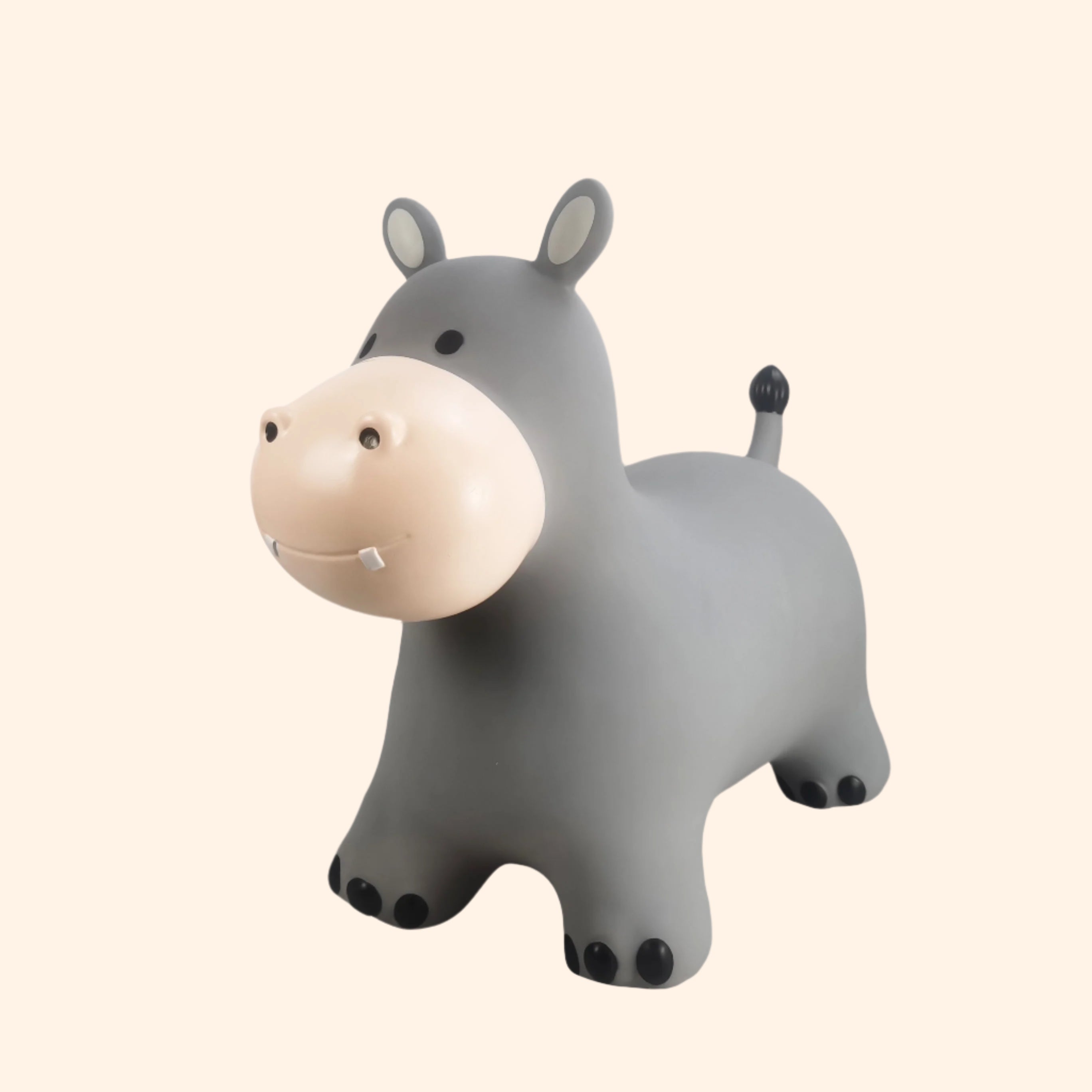 Angle view of Holger the light grey hippo bouncing toy with black accents – Find That Hippo
